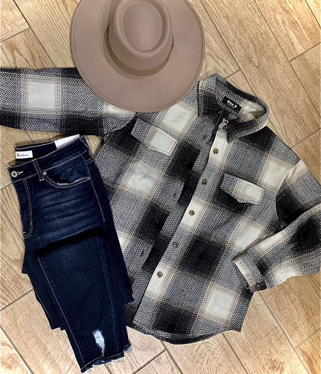 Flannel Shacket with skinny jeans and fall hat clothing flatlay