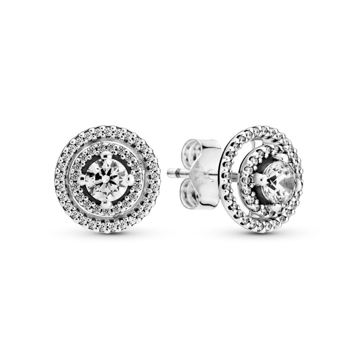 Sterling silver stud earrings with detachable earring jackets and clear cubic zirconia