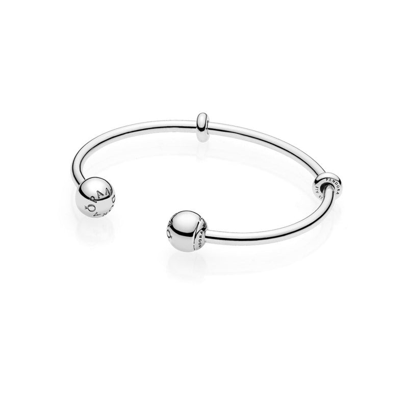 Open bangle in sterling silver with interchangeable PANDORA logo end caps 4