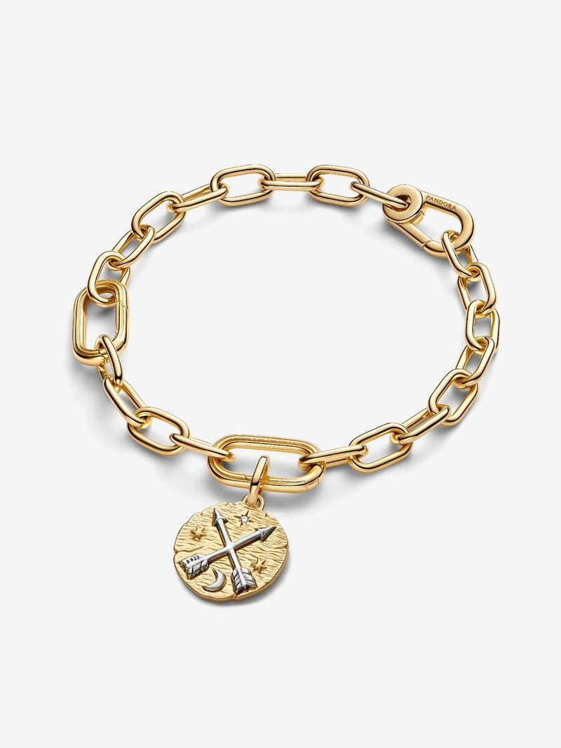 Crossing arrows sterling silver and 14k gold-plated medallion