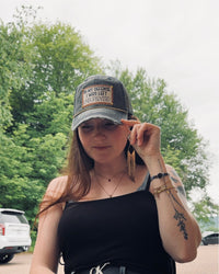 "In My Defense" Distressed Trucker Cap