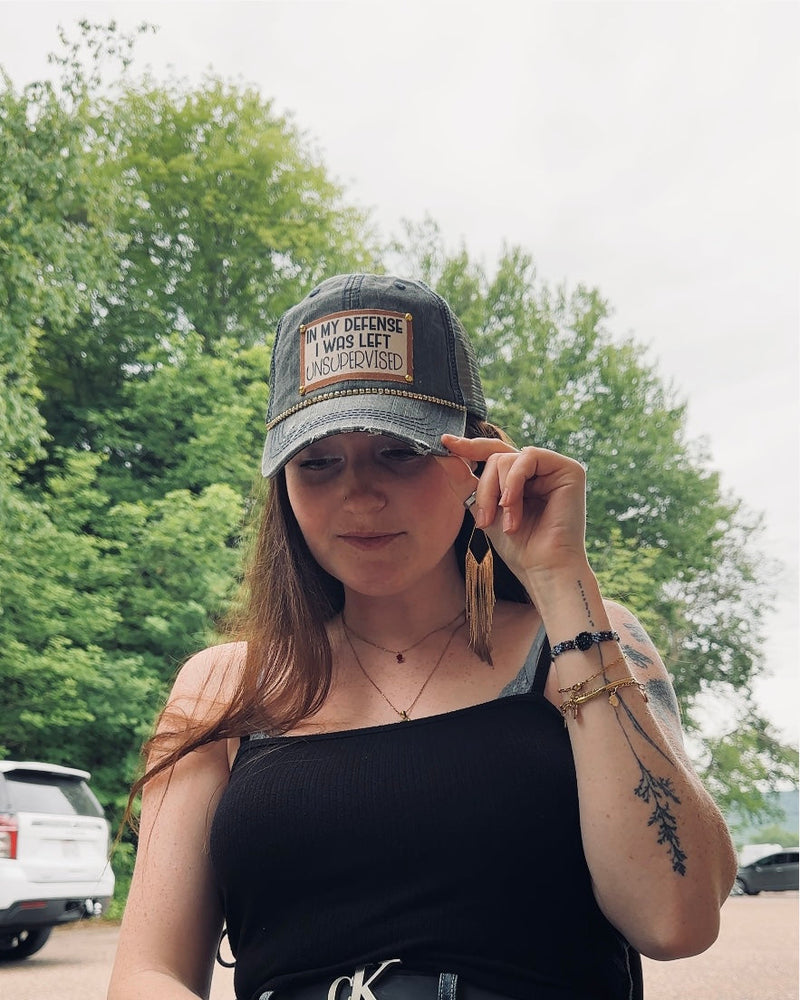 "In My Defense" Distressed Trucker Cap