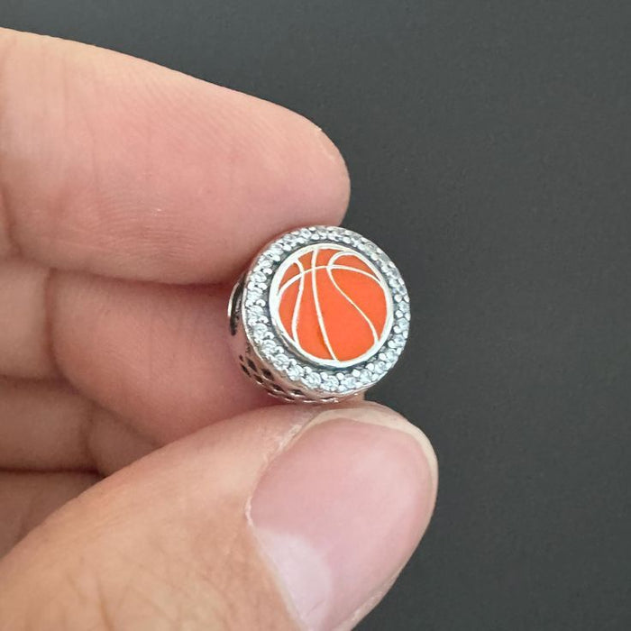 Basketball sterling silver charm with clear cubic zirconia and orange enamel