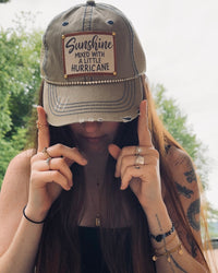 "Sunshine Mixed With a Little Hurricane" Distressed Trucker Cap