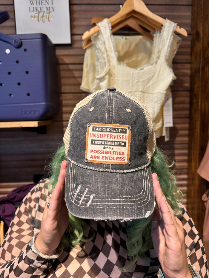 "Currently Unsupervised" Distressed Trucker Cap