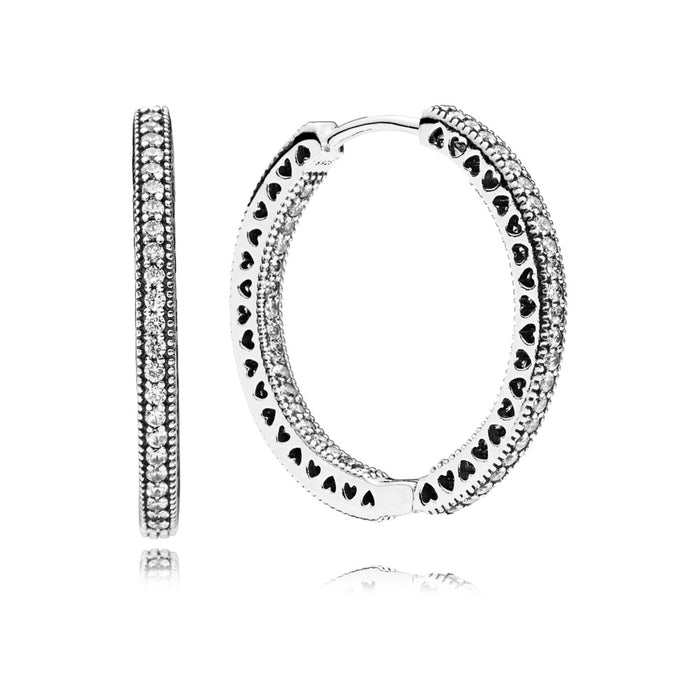 Hoop earrings in sterling silver with clear cubic zirconia and cut-out heart details